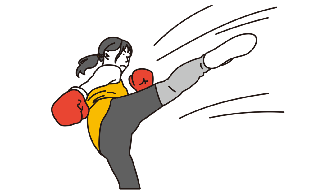 キックボクシングをする女性